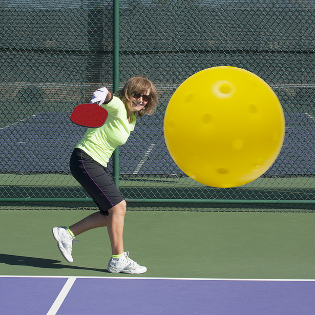 woman playing pickleball